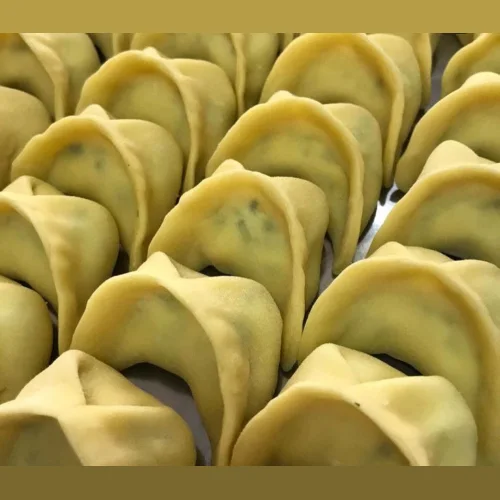 Ravioli from veal with spinach and cheese
