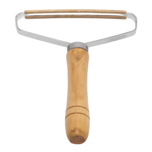 A scraper for cleaning furniture, carpets, clothes
