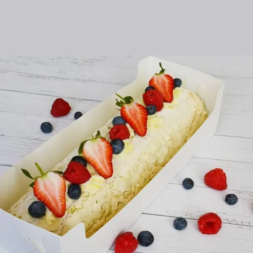 Classic meringue roll with fresh strawberries