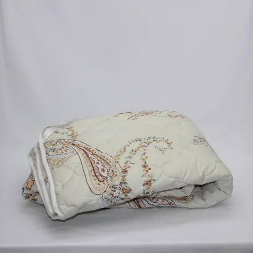 Quilted blanket (printed calico, 125 g/m2), without packaging, designs in assortment. 