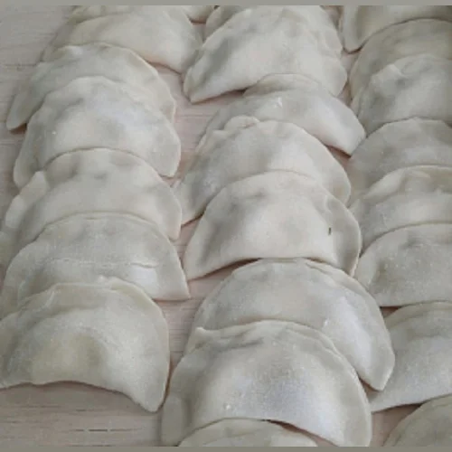 Dumplings with cottage cheese and greens
