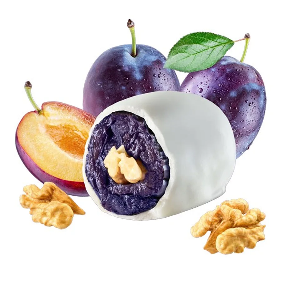 Candy prunes in yoghurt glaze with walnut weights
