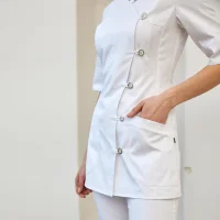 Medical blouse with an asymmetric side