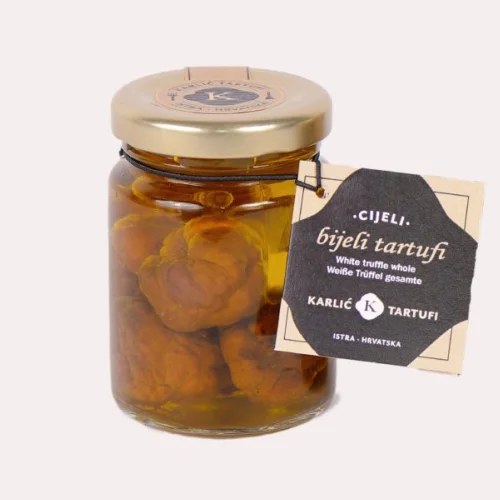 White truffle whole (Tuber Borchi) in olive oil