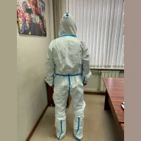 A working paint suit for painting works with shoe covers (overalls)