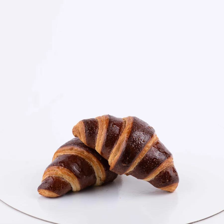 Croissant colored with chocolate