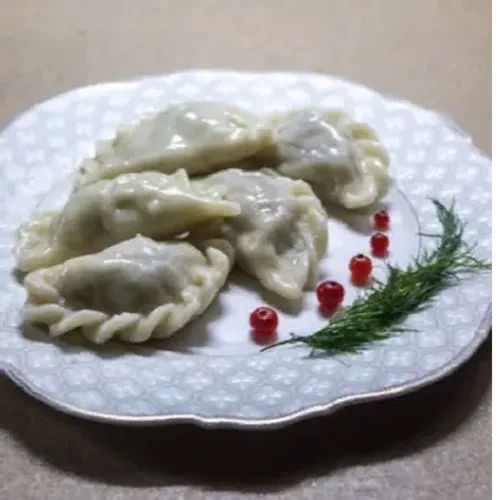 Various dumplings with fresh cabbage