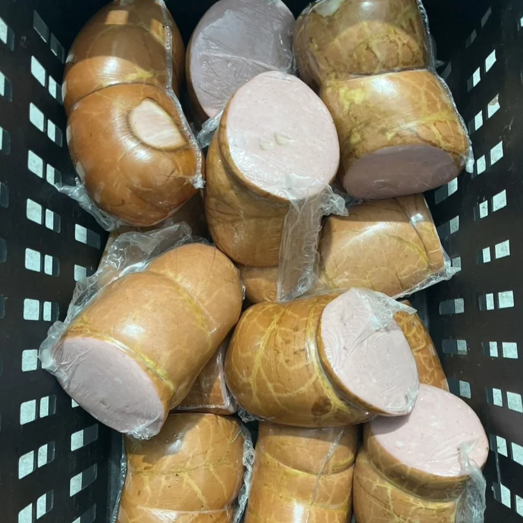 Boiled sausages and ham