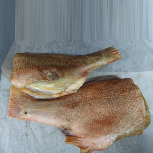 Perch sea carcass gutted without cold smoking head