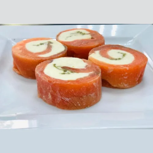 Roulet from trout with cheese and pistachios
