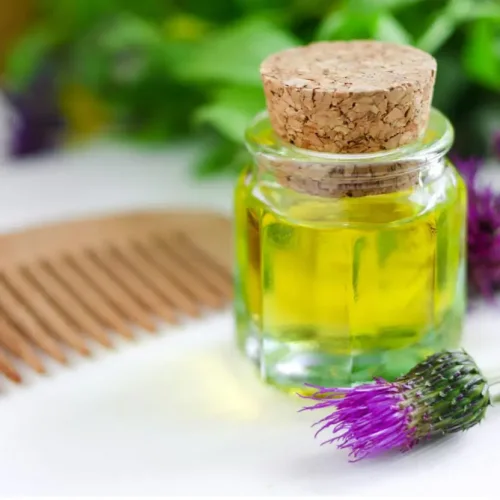 Massage oil with burdock extract